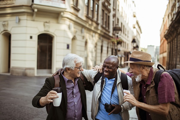 Close up of a group of male senior tourists exploring the city